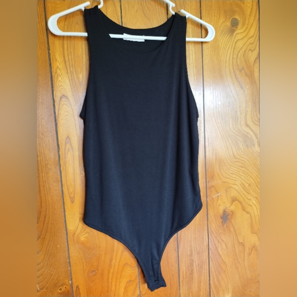Two bodysuits black and gray size medium. NWOT and EUC 1x worn